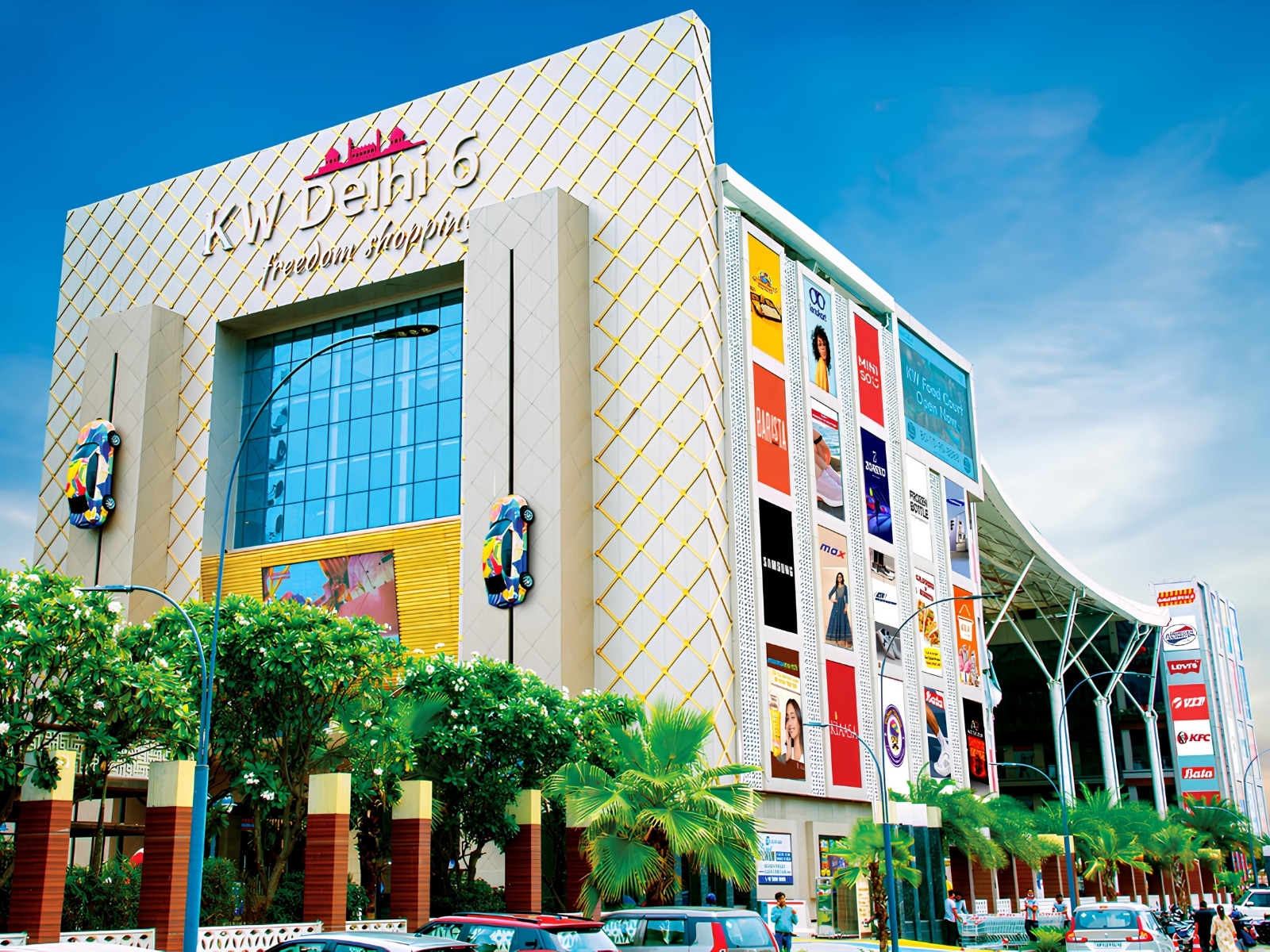 KW Delhi 6 funnel-shaped commercial complex with illuminated facade in Raj Nagar Extension
